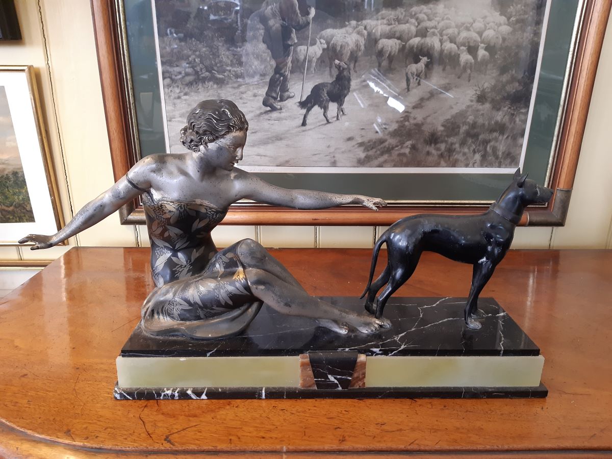Art Deco spelter sculpture, woman and dog